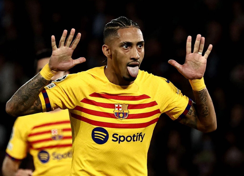 Raphinha celebrates one of his goals against PSG. 